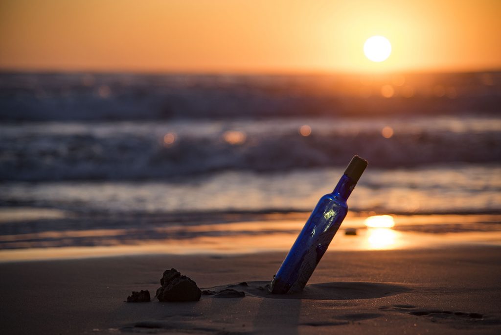 tequila bottle on the beach