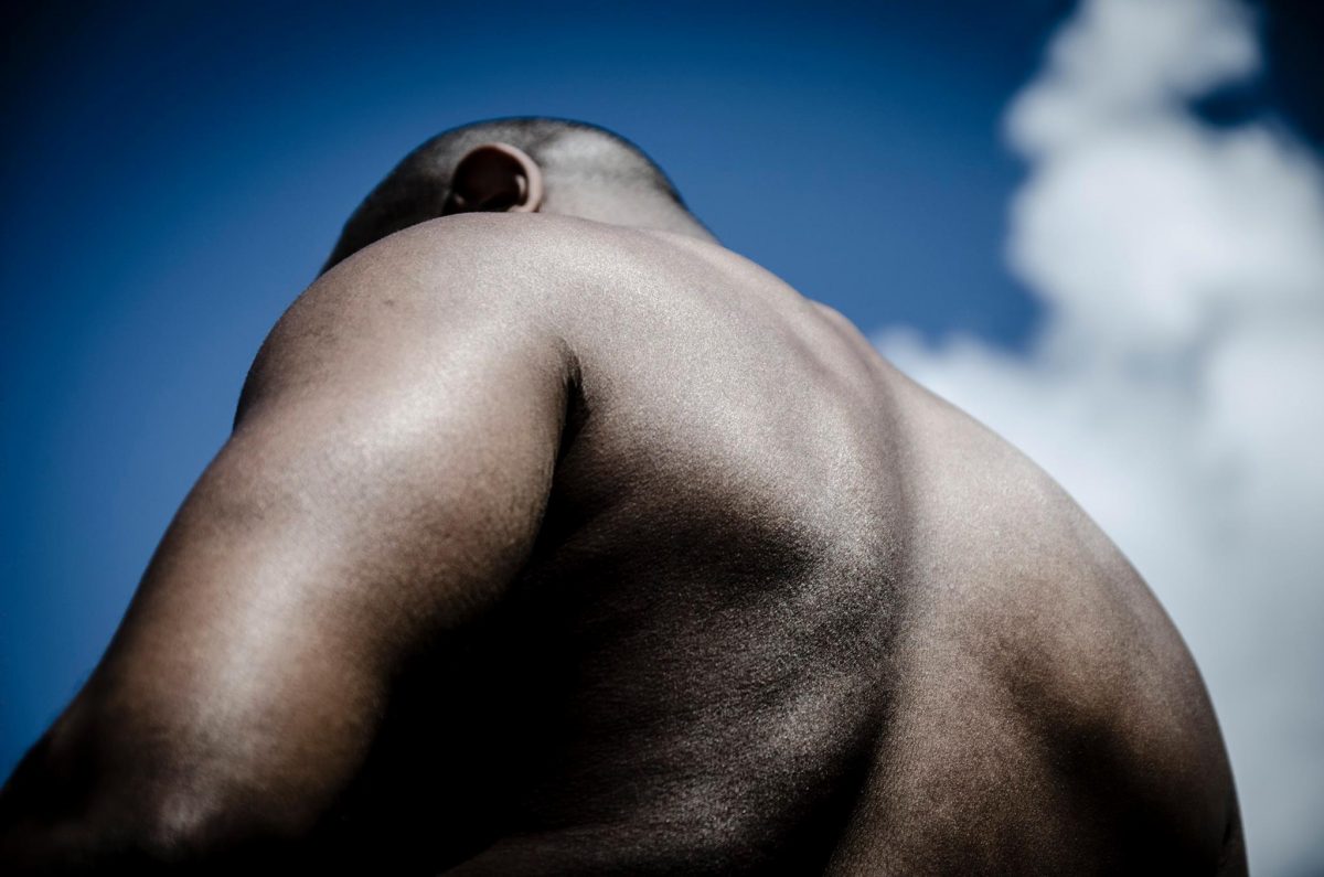 Jamahl Kersey, model, represents the moon in this photo by Arash Afshar, for Sarah Lujan's poem, Moon Baby.
